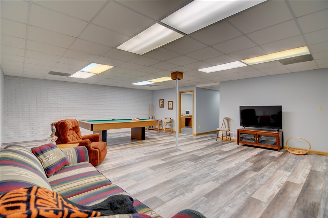 9234 Cabin Road Argenta, IL 62501 - Photo 36 of 47 a living room with furniture and a flat screen tv