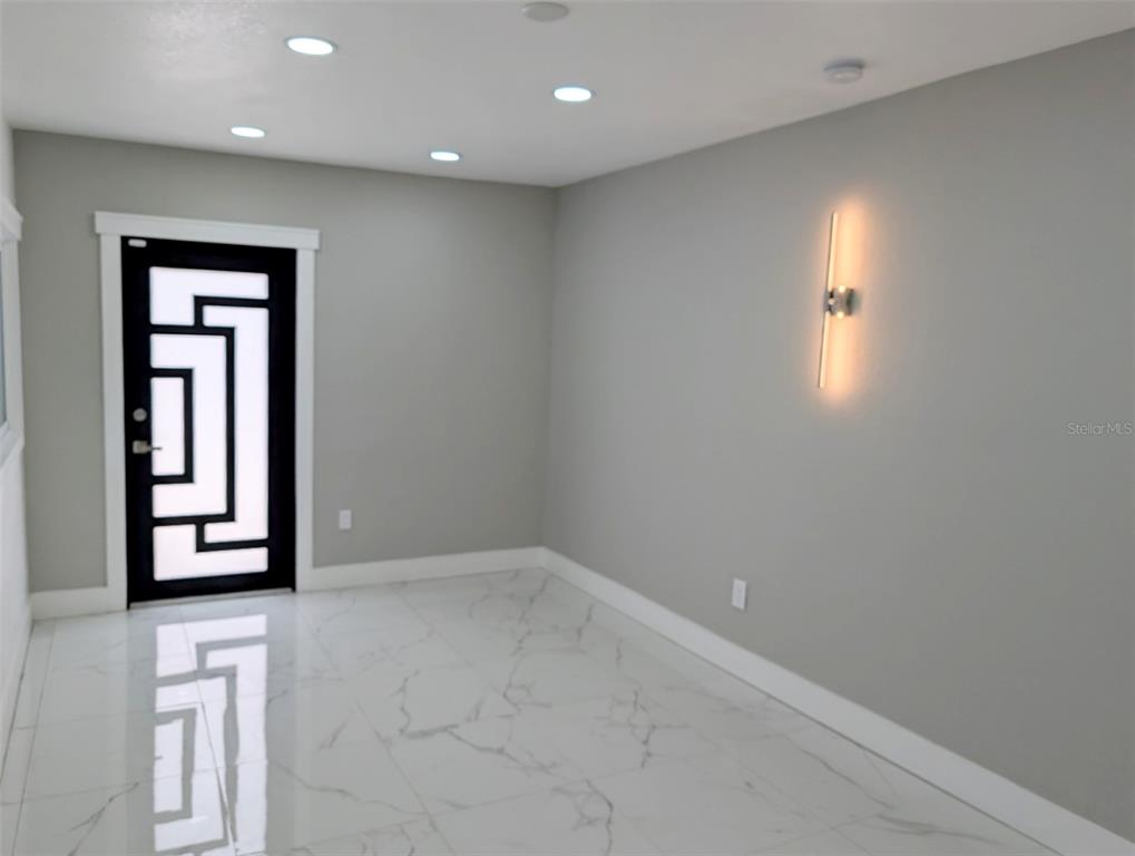 1245 North Pine Hills Road Orlando, FL 32808 - Photo 13 of 14 a view of an empty room