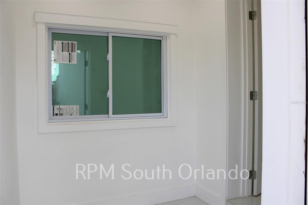 1245 North Pine Hills Road Orlando, FL 32808 - Photo 7 of 14 a view of front door