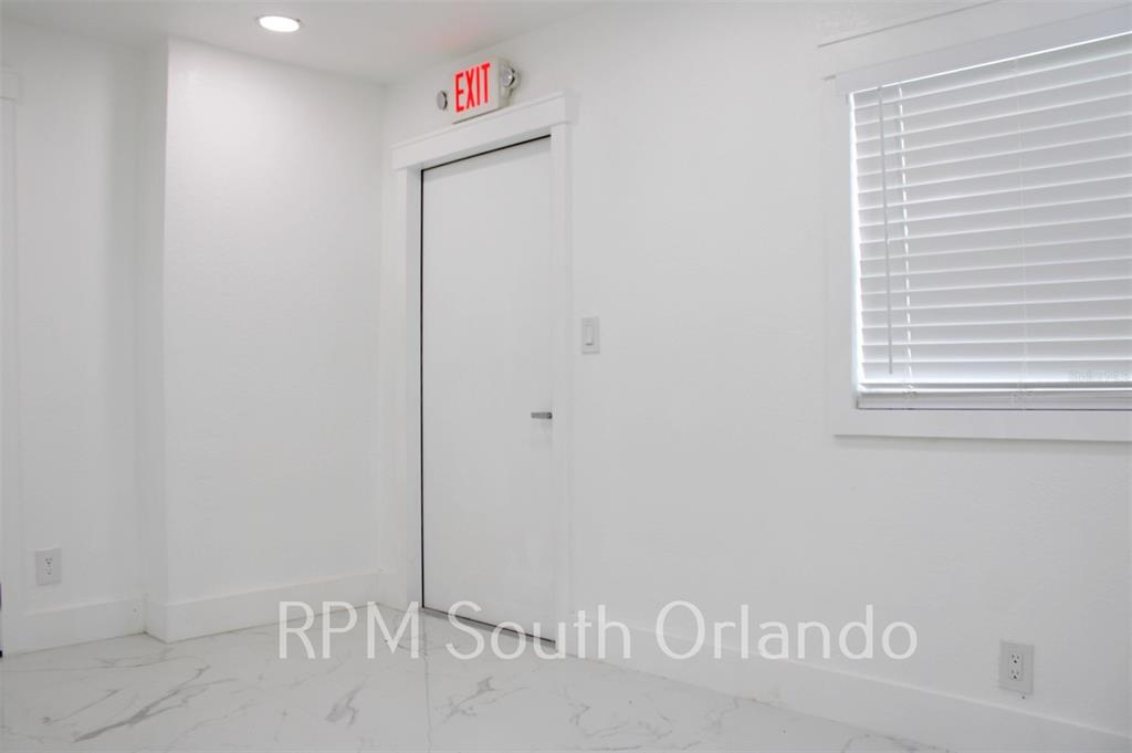 1245 North Pine Hills Road Orlando, FL 32808 - Photo 10 of 14 a close up of a shower