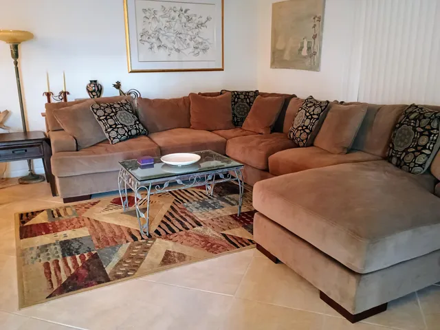 a living room with furniture and a couch