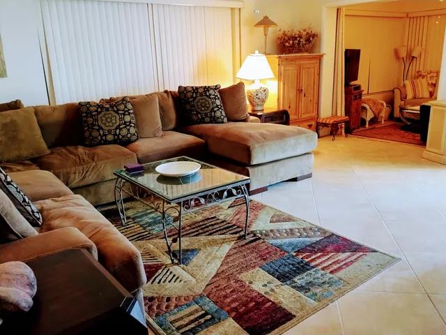 a living room with furniture and a couch