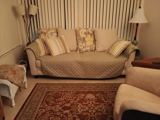 a bedroom with bed and a window