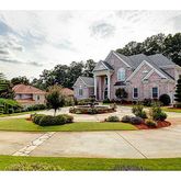 a view of multiple houses with a yard