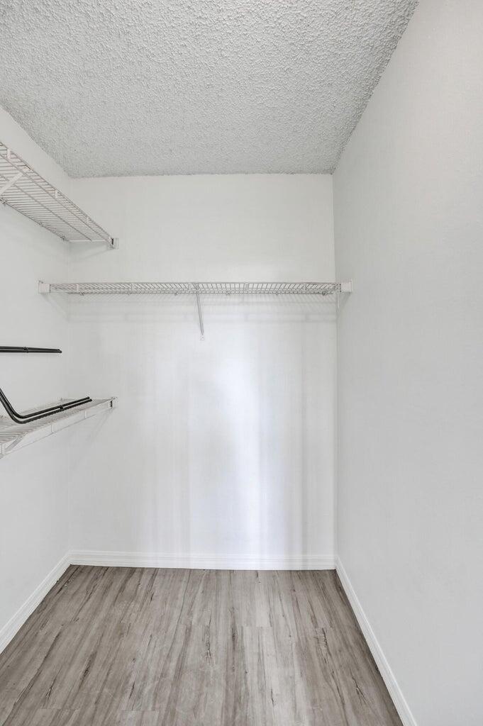 4015 West McNab Road, Unit D204 Pompano Beach, FL 33069 - Photo 34 of 46 a view of an empty walk in closet