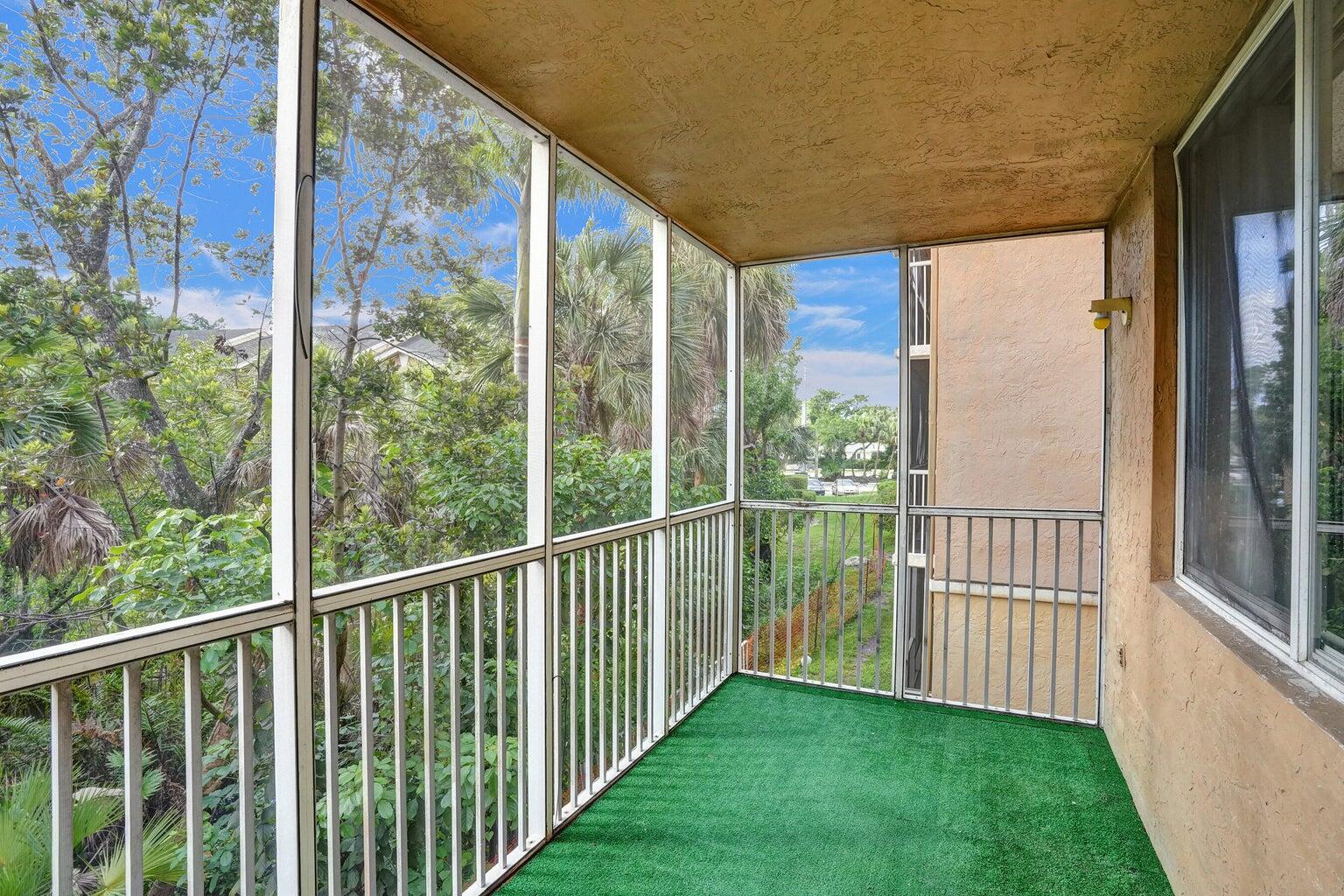 4015 West McNab Road, Unit D204 Pompano Beach, FL 33069 - Photo 36 of 46 a view of a city from a balcony