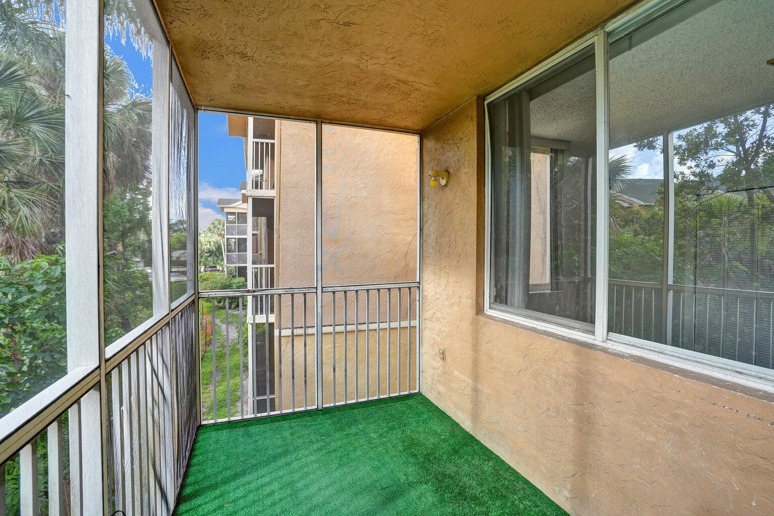 4015 West McNab Road, Unit D204 Pompano Beach, FL 33069 - Photo 37 of 46 a view of a balcony