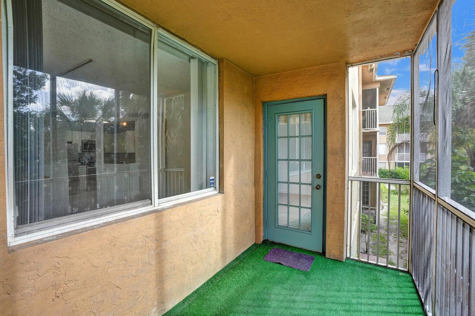 4015 West McNab Road, Unit D204 Pompano Beach, FL 33069 - Photo 38 of 46 a view of front door and porch