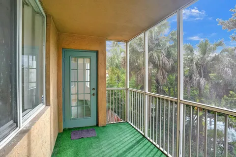 a view of a porch with a yard