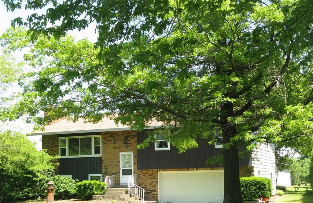 251 Highmeyer Road Erie, PA 16511 - Photo 1 of 1 a front view of a house with a tree