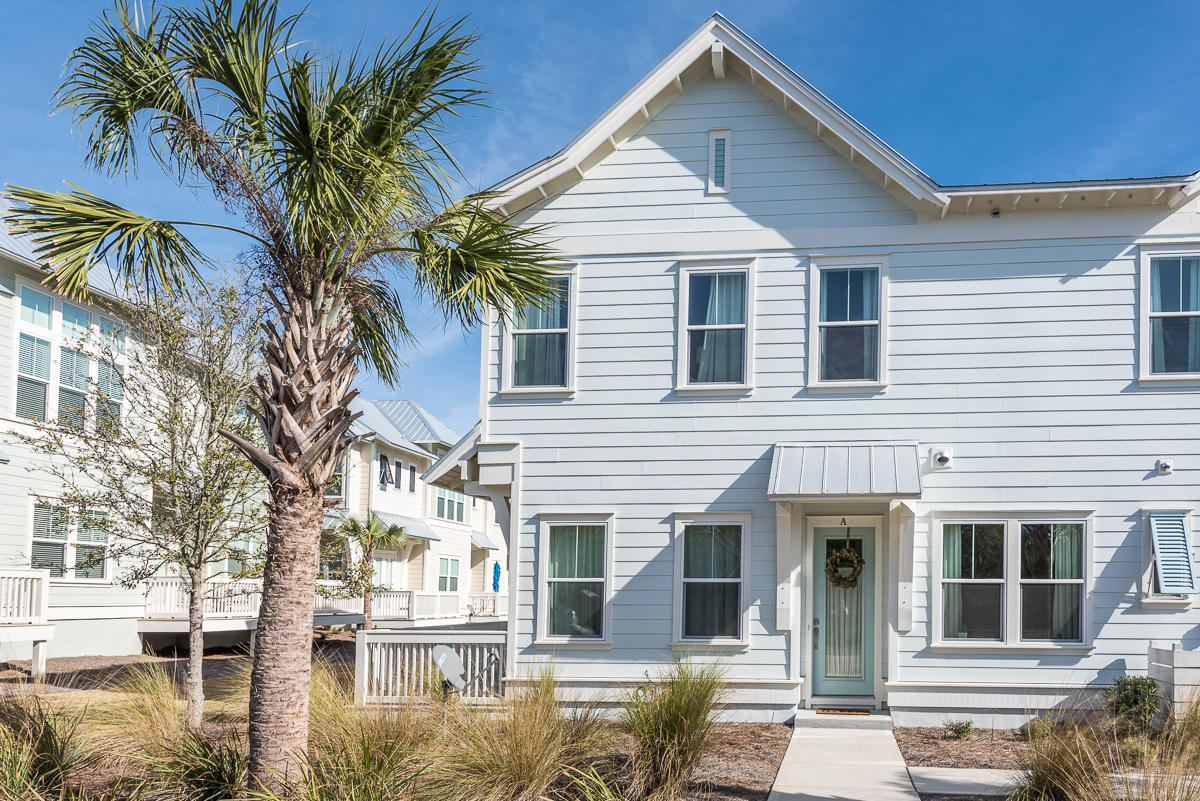 104 Milestone Dr Inlet Beach, Unit A Inlet Beach, FL 32461 - Photo 2 of 10 a front view of a house with a yard