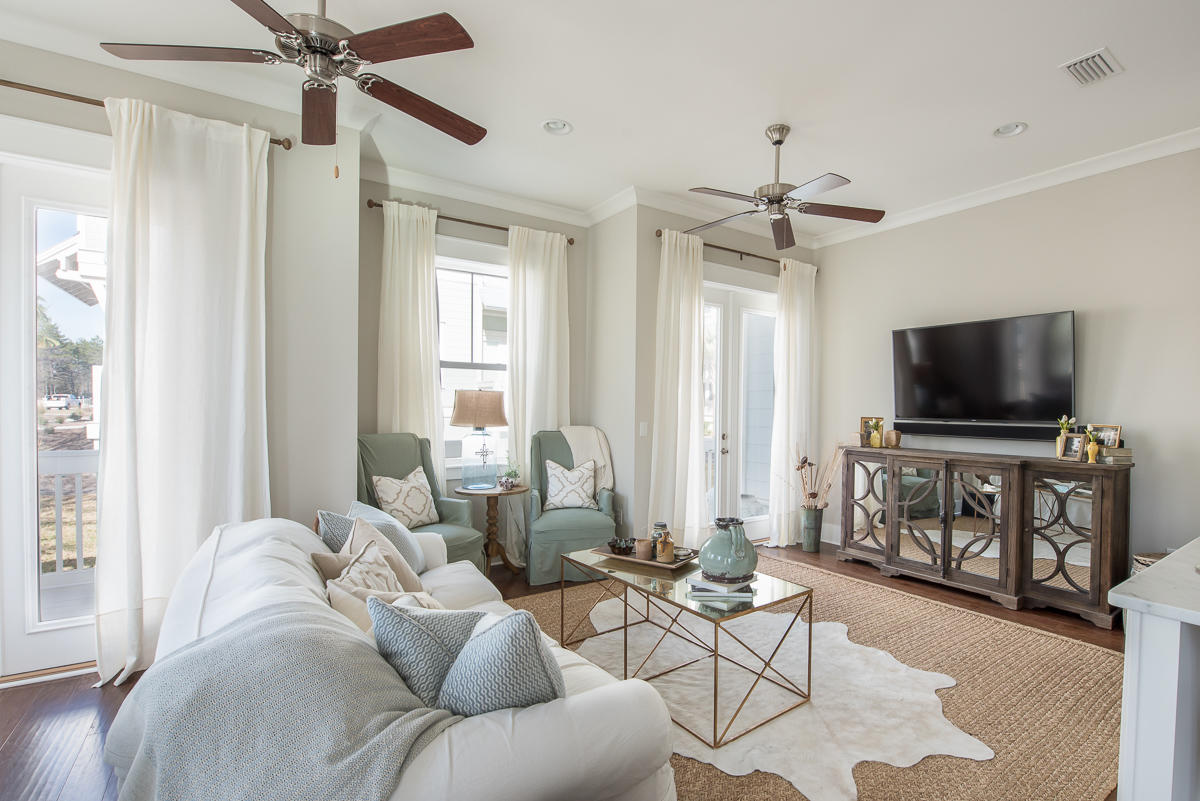 104 Milestone Dr Inlet Beach, Unit A Inlet Beach, FL 32461 - Photo 3 of 10 a living room with furniture and a flat screen tv