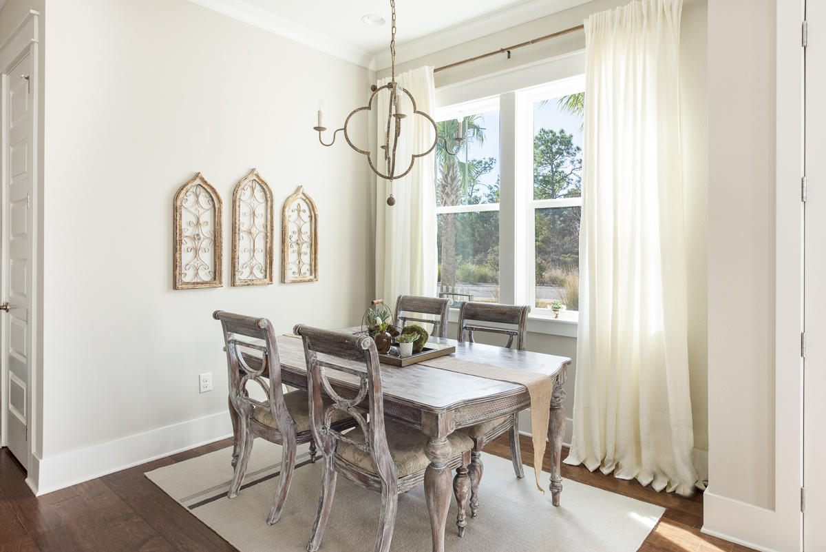 104 Milestone Dr Inlet Beach, Unit A Inlet Beach, FL 32461 - Photo 4 of 10 a dining room with furniture and window