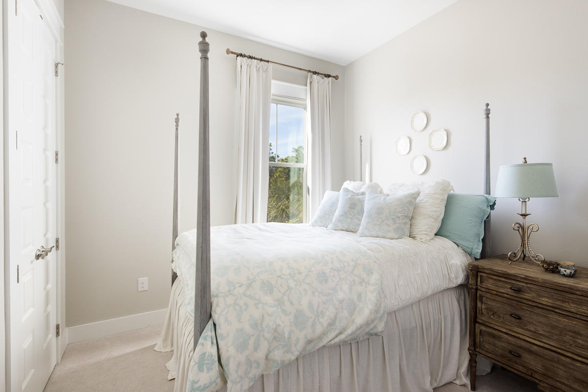 104 Milestone Dr Inlet Beach, Unit A Inlet Beach, FL 32461 - Photo 5 of 10 a bedroom with a bed and a window