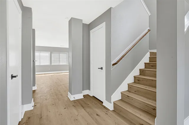 a view of entryway with wooden floor