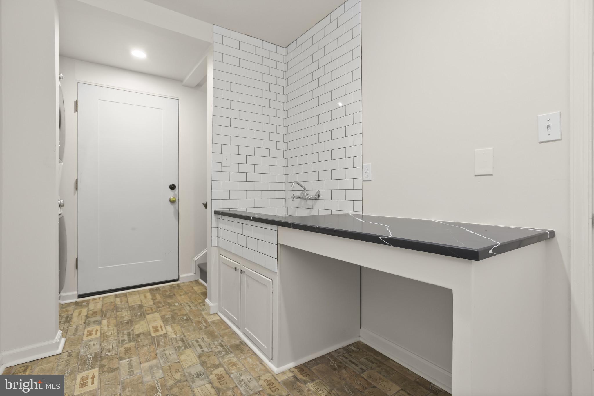 12261 Etchison Road Ellicott City, MD 21042 - Photo 27 of 69 Laundry Room with utility sink