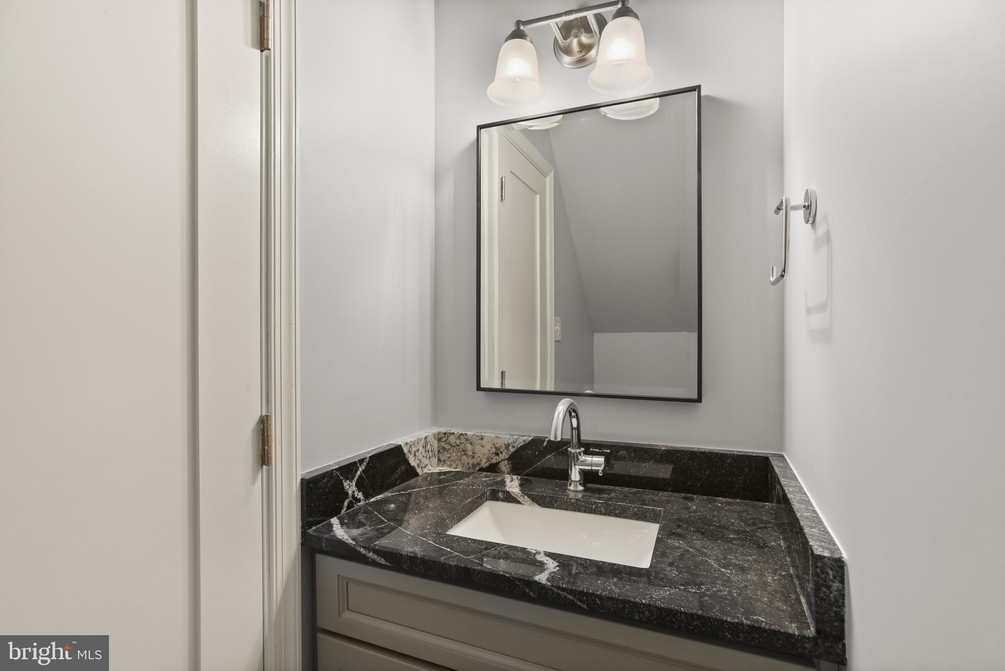 12261 Etchison Road Ellicott City, MD 21042 - Photo 48 of 69 Above garage powder room