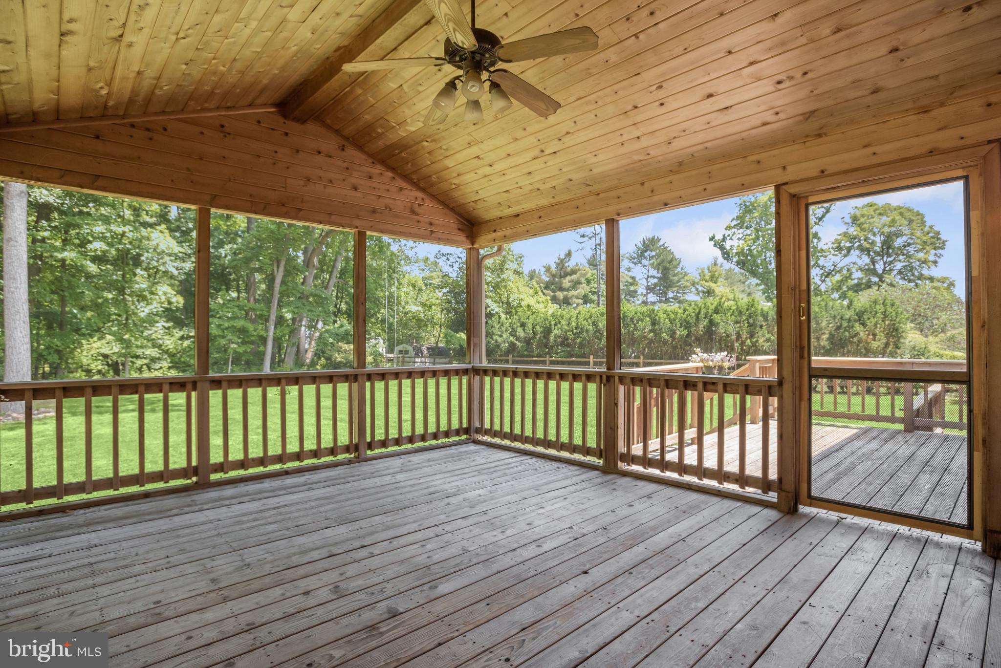 12261 Etchison Road Ellicott City, MD 21042 - Photo 54 of 69 Screened porch & open deck