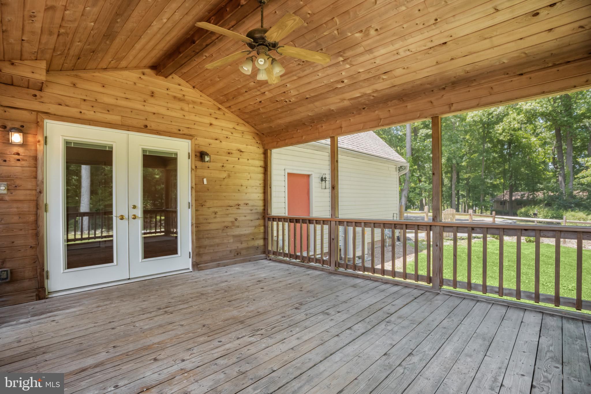 12261 Etchison Road Ellicott City, MD 21042 - Photo 55 of 69 Screened porch