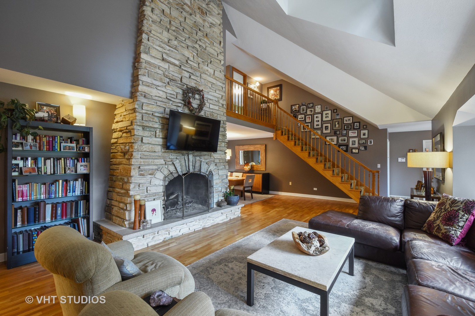 1750 Banbury Road Inverness, IL 60067 - Photo 2 of 31 a living room with furniture and a fireplace