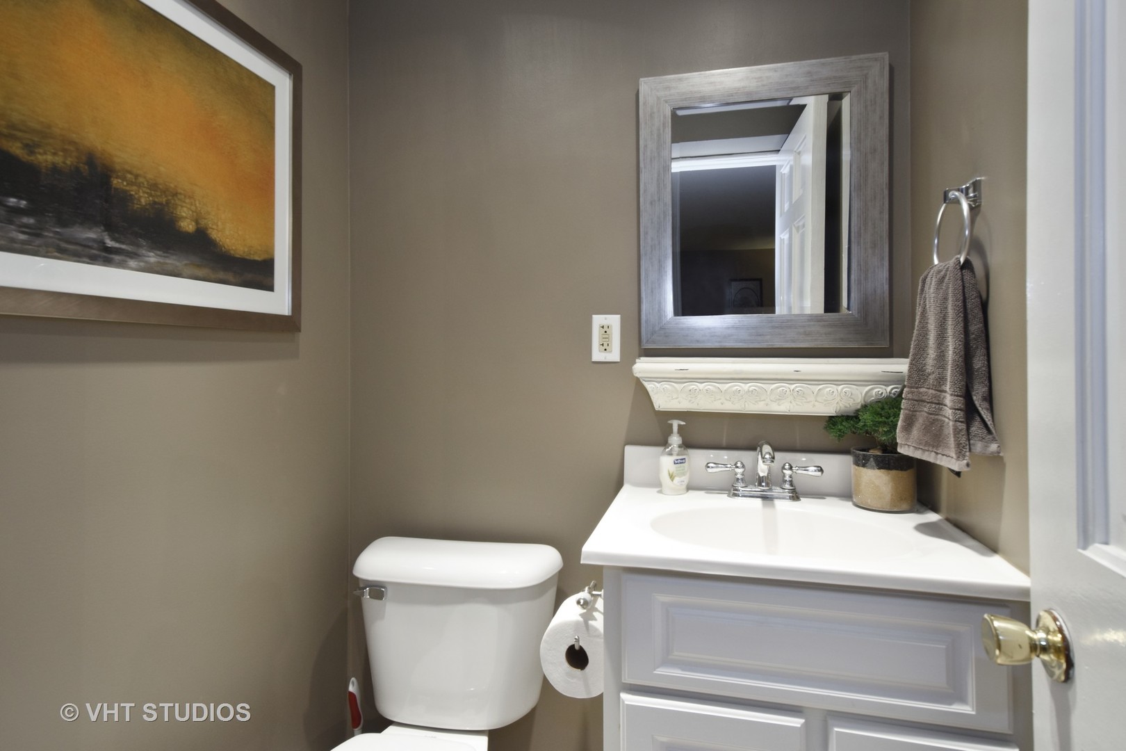 1750 Banbury Road Inverness, IL 60067 - Photo 16 of 31 a white toilet sitting next to a bathroom sink