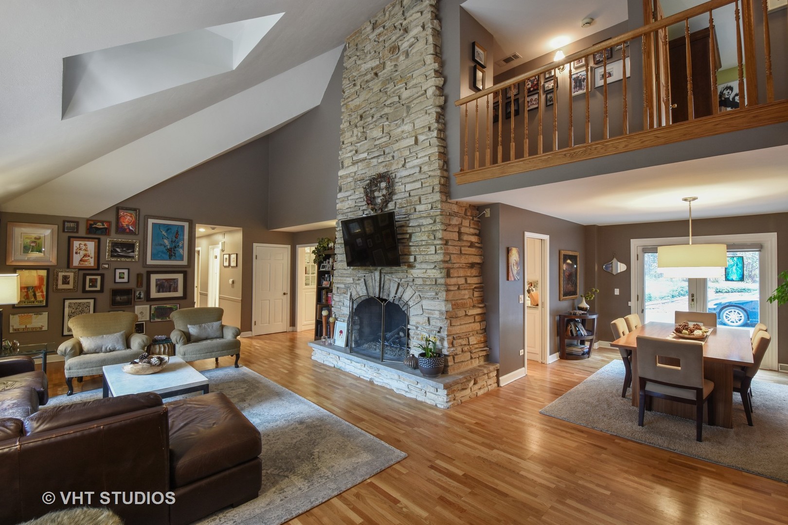 1750 Banbury Road Inverness, IL 60067 - Photo 3 of 31 a living room with furniture or fireplace and wooden floor