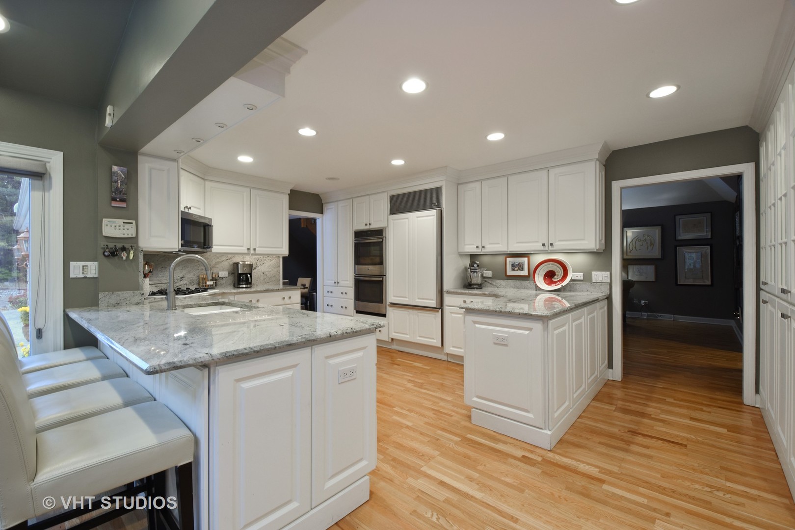 1750 Banbury Road Inverness, IL 60067 - Photo 4 of 31 a kitchen with white cabinets and sink