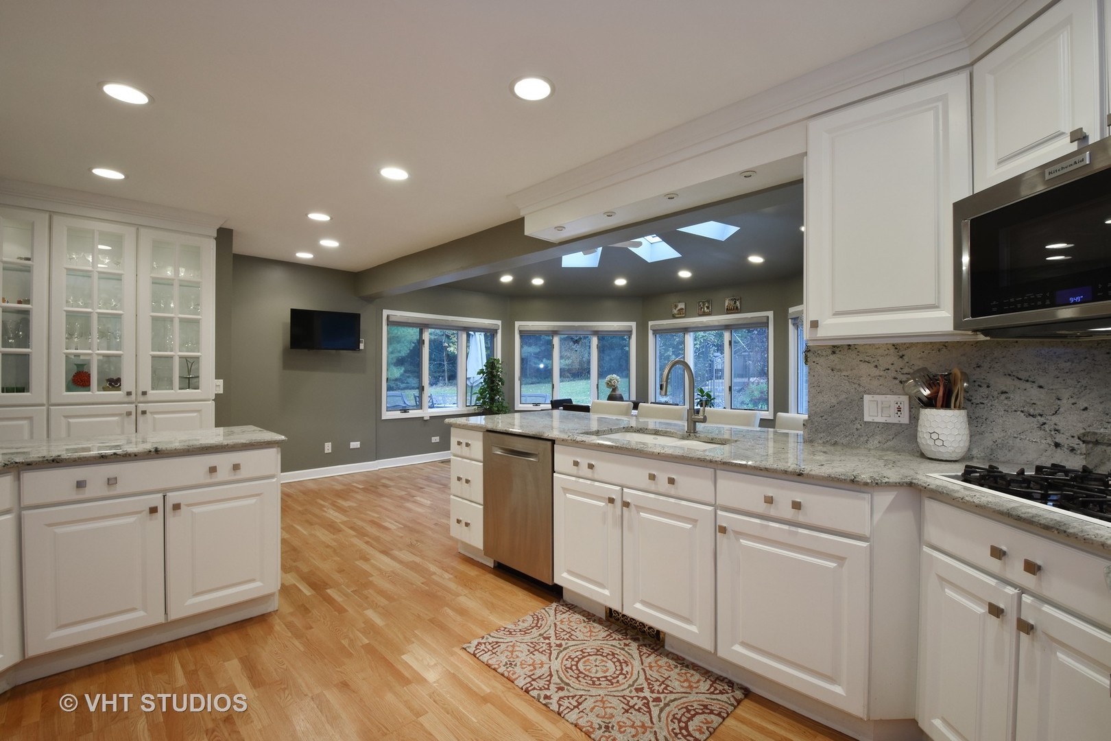 1750 Banbury Road Inverness, IL 60067 - Photo 5 of 31 a large kitchen with stainless steel appliances granite countertop a sink and cabinets