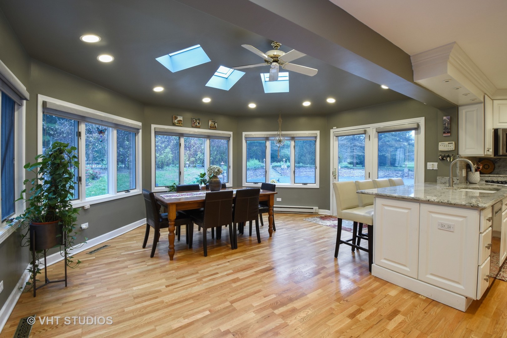 1750 Banbury Road Inverness, IL 60067 - Photo 6 of 31 a view of a dining room with furniture window and wooden floor