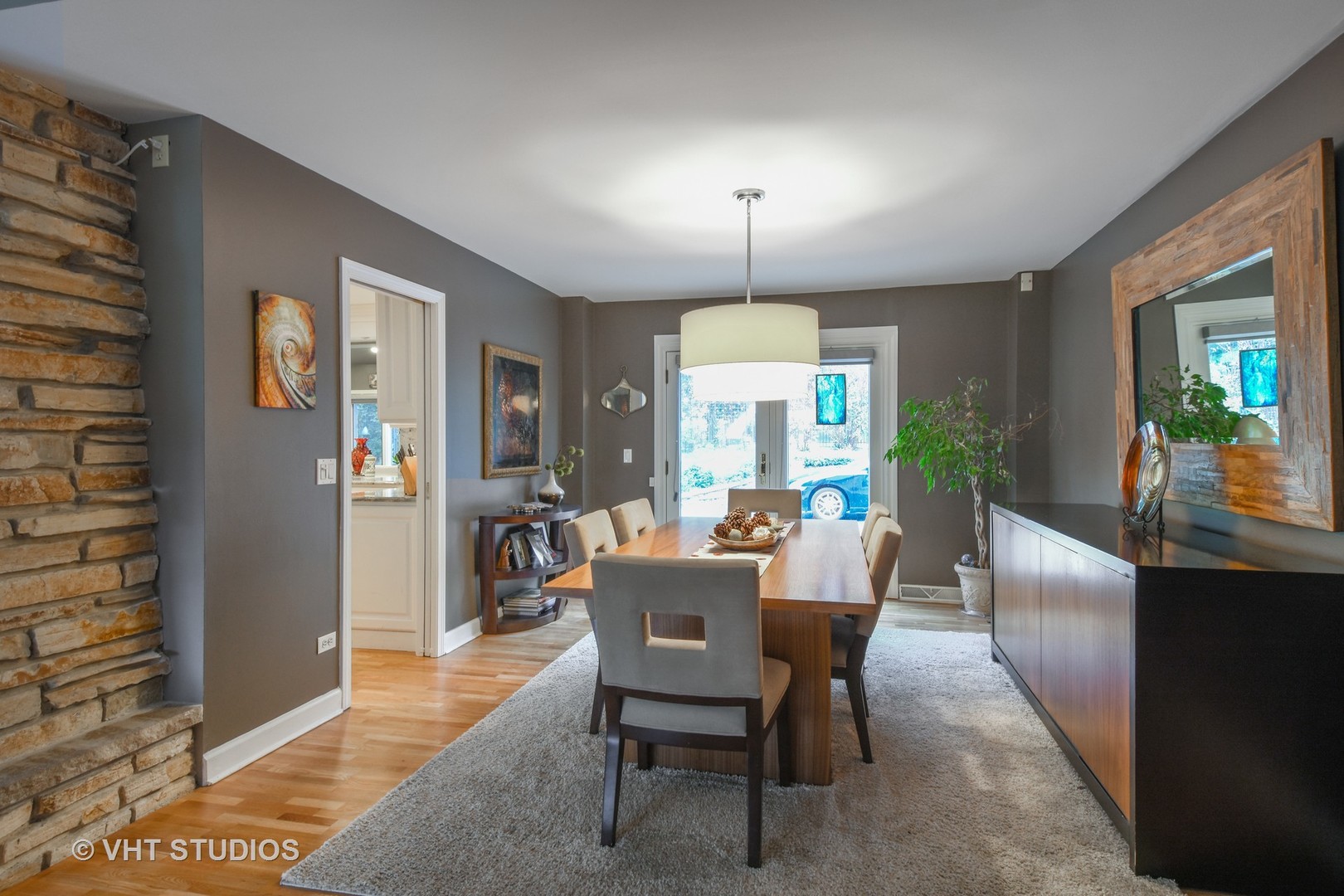 1750 Banbury Road Inverness, IL 60067 - Photo 7 of 31 a view of a dining room with furniture window and wooden floor