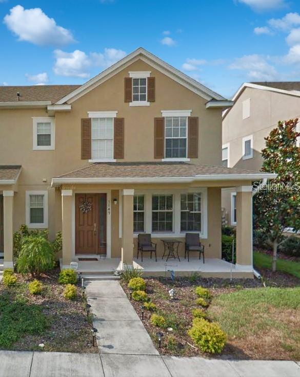 11749 Fitzgerald Butler Road Orlando, FL 32836 - Photo 1 of 1 a front view of a house with garden