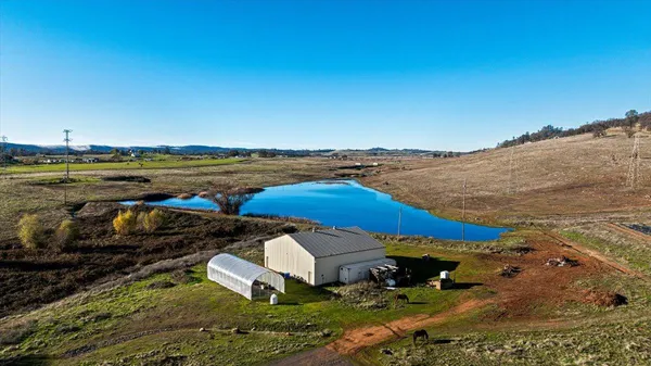 a view of a lake with a building in the background