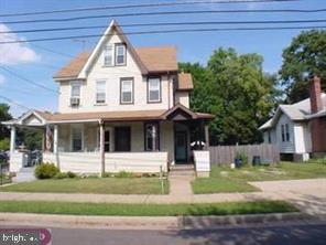 645 Bridgeboro Street Riverside, NJ 08075 - Photo 1 of 1 a front view of a house with a yard