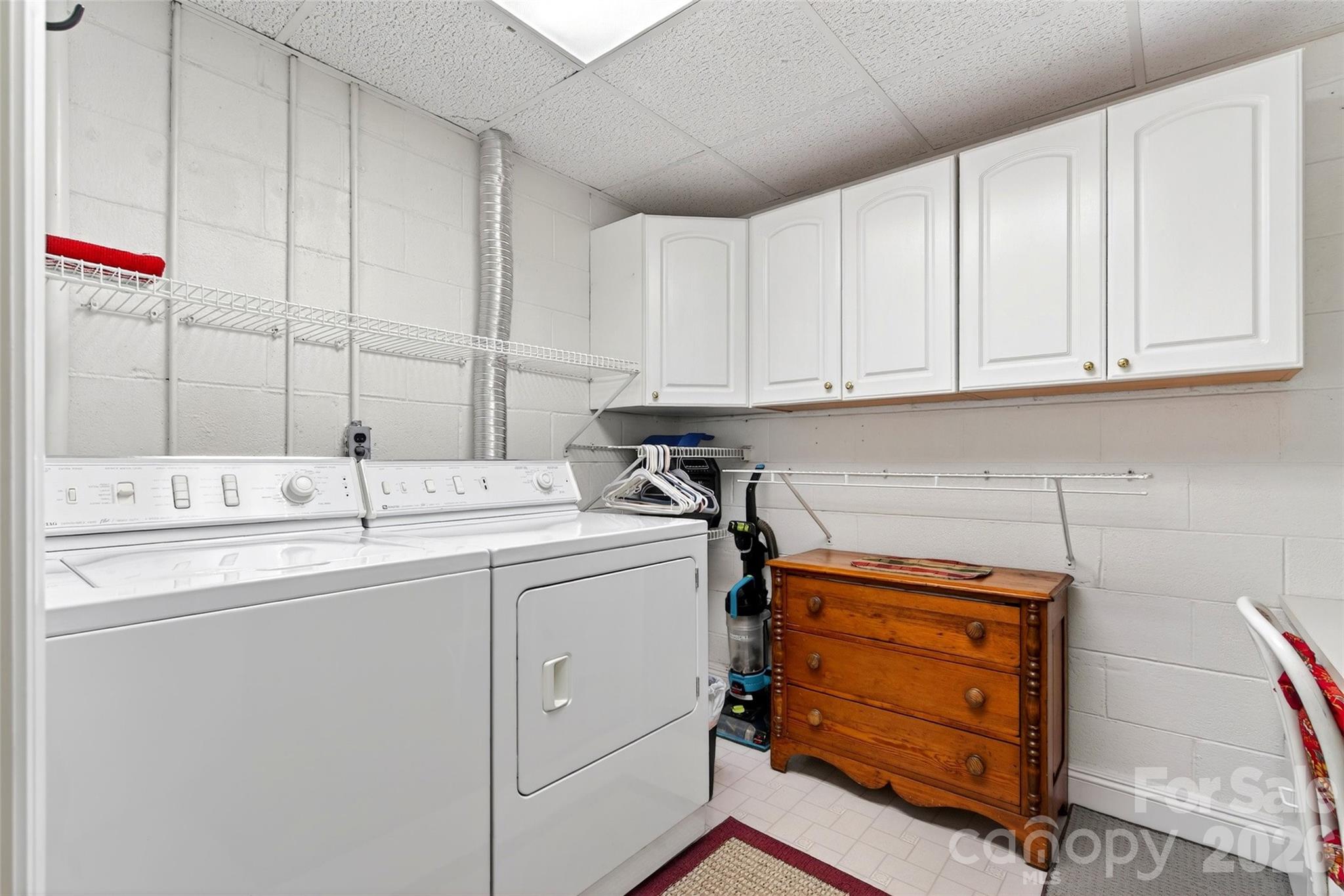 334 Harbor Lake Road Newland, NC 28657 - Photo 35 of 48 a utility room with cabinets