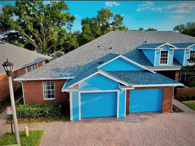 a house view with a garden space