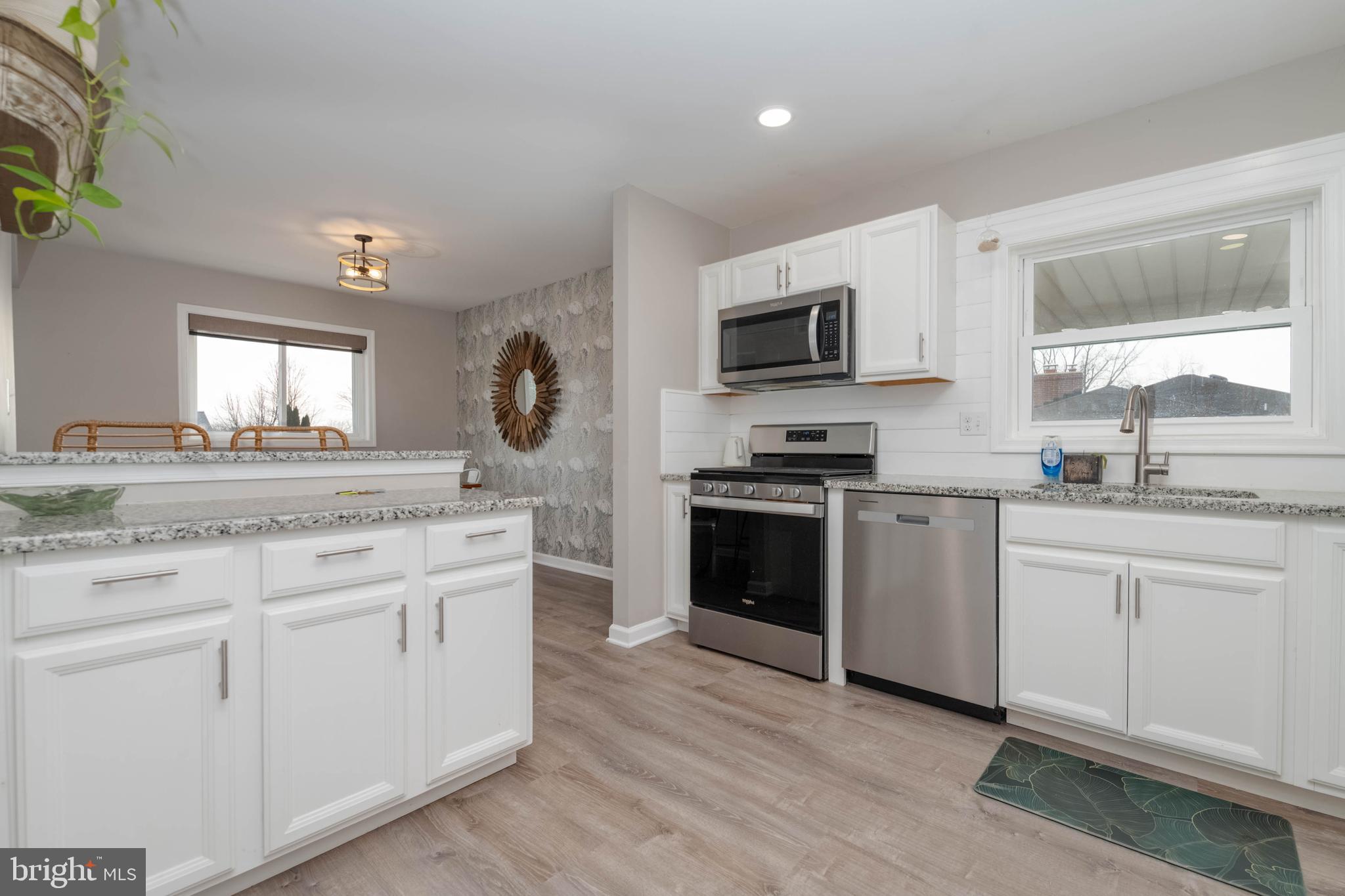 1522 Southview Road Bel Air, MD 21015 - Photo 13 of 42 a kitchen with granite countertop a sink cabinets and stainless steel appliances