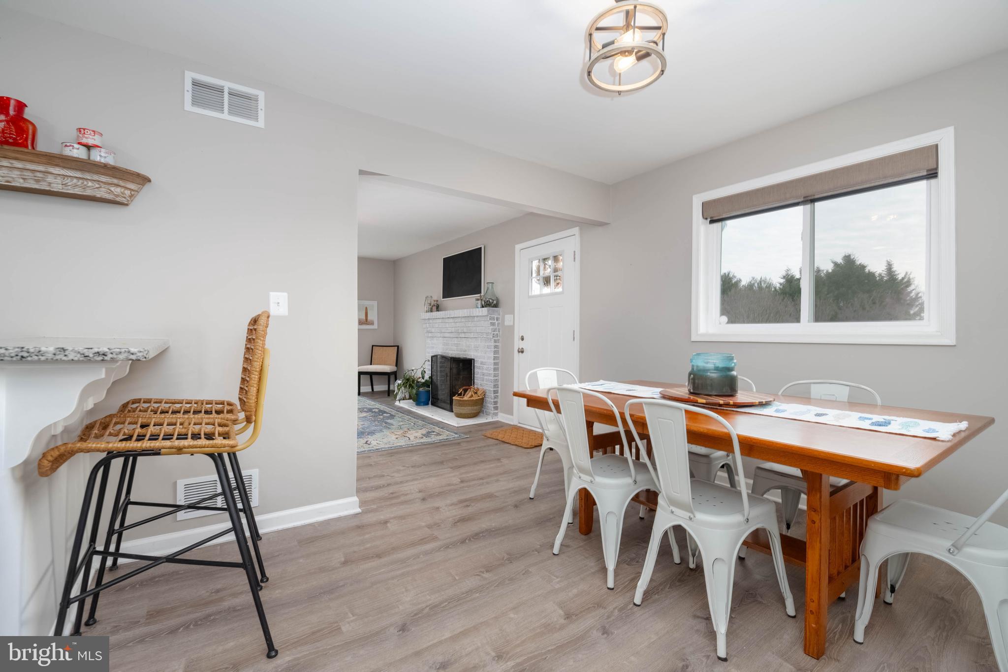 1522 Southview Road Bel Air, MD 21015 - Photo 15 of 42 a view of a dining room with furniture and a window