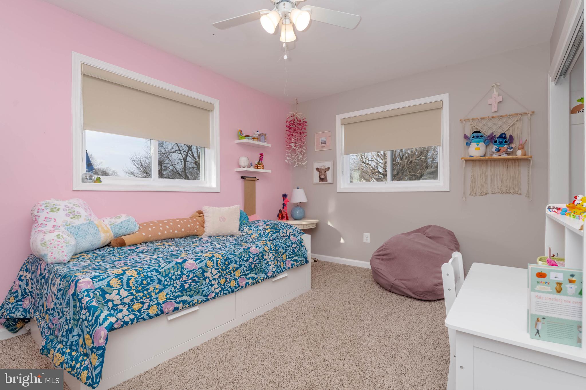 1522 Southview Road Bel Air, MD 21015 - Photo 22 of 42 a bed room with a bed and a chandelier