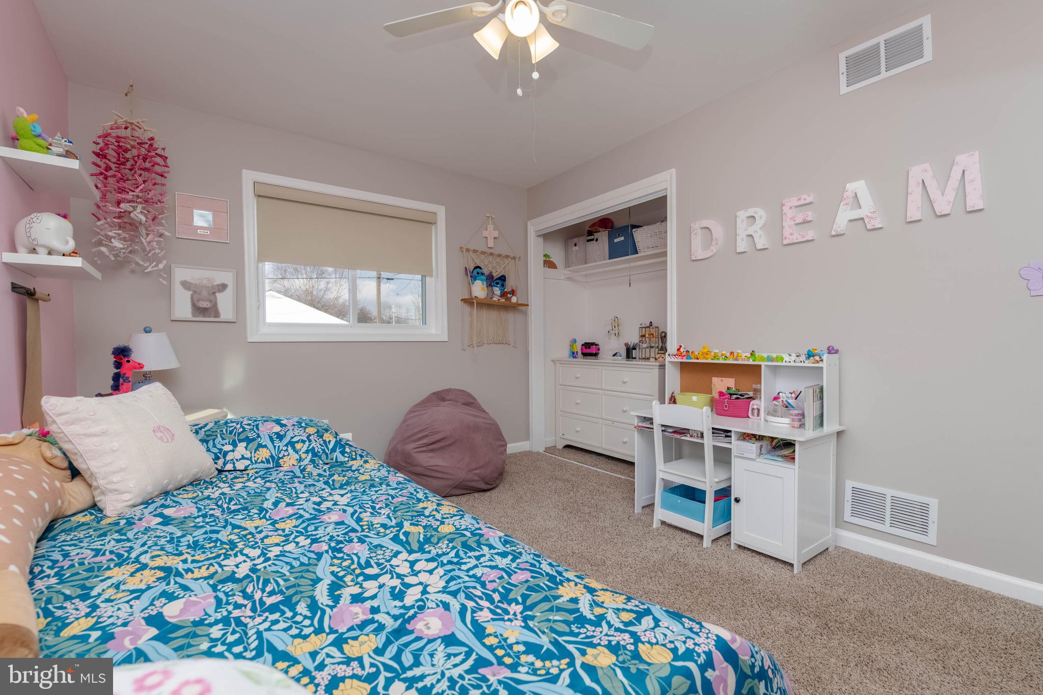 1522 Southview Road Bel Air, MD 21015 - Photo 23 of 42 a bedroom with a bed and a chandelier