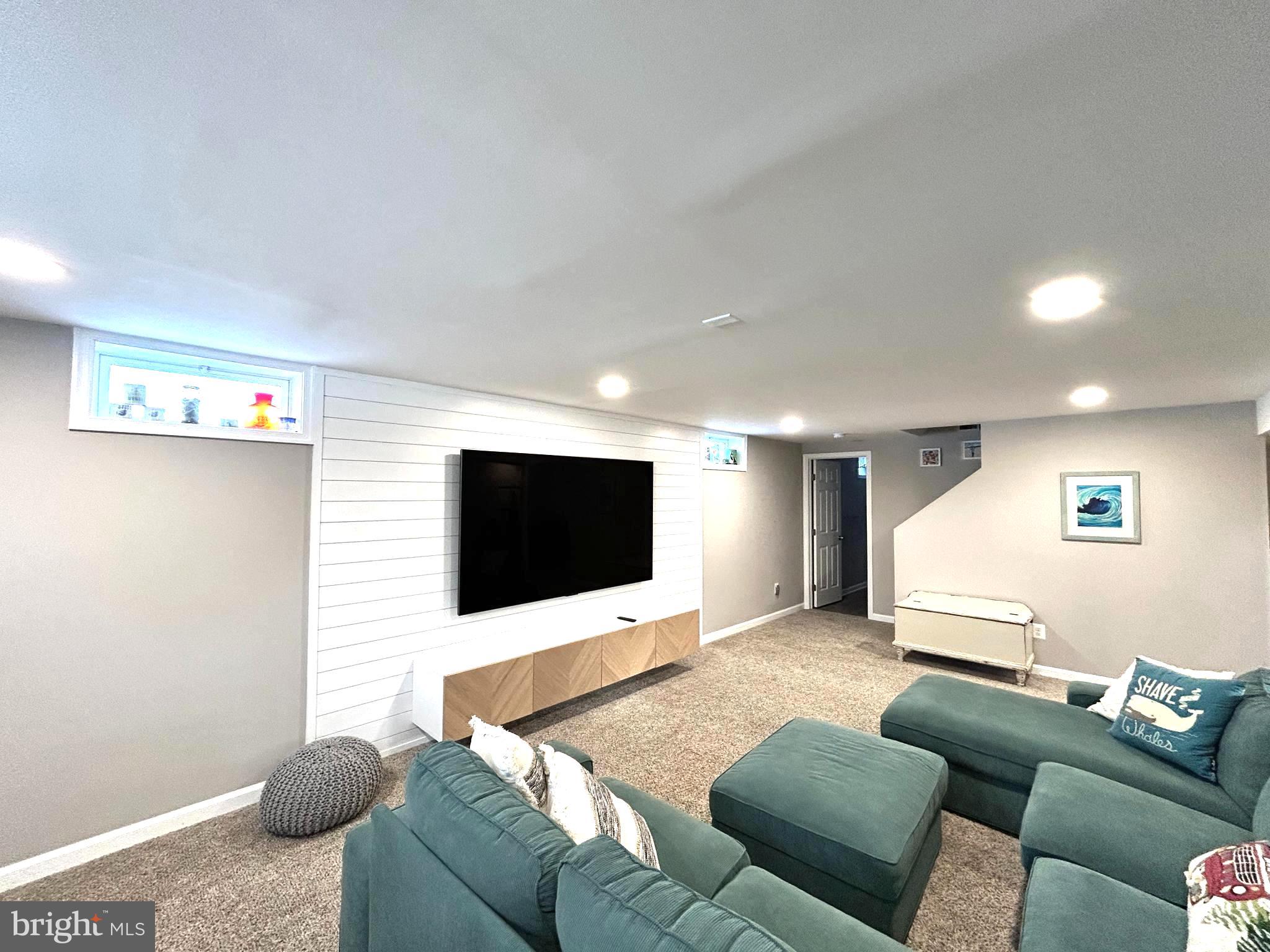 1522 Southview Road Bel Air, MD 21015 - Photo 5 of 7 a living room with furniture and a flat screen tv