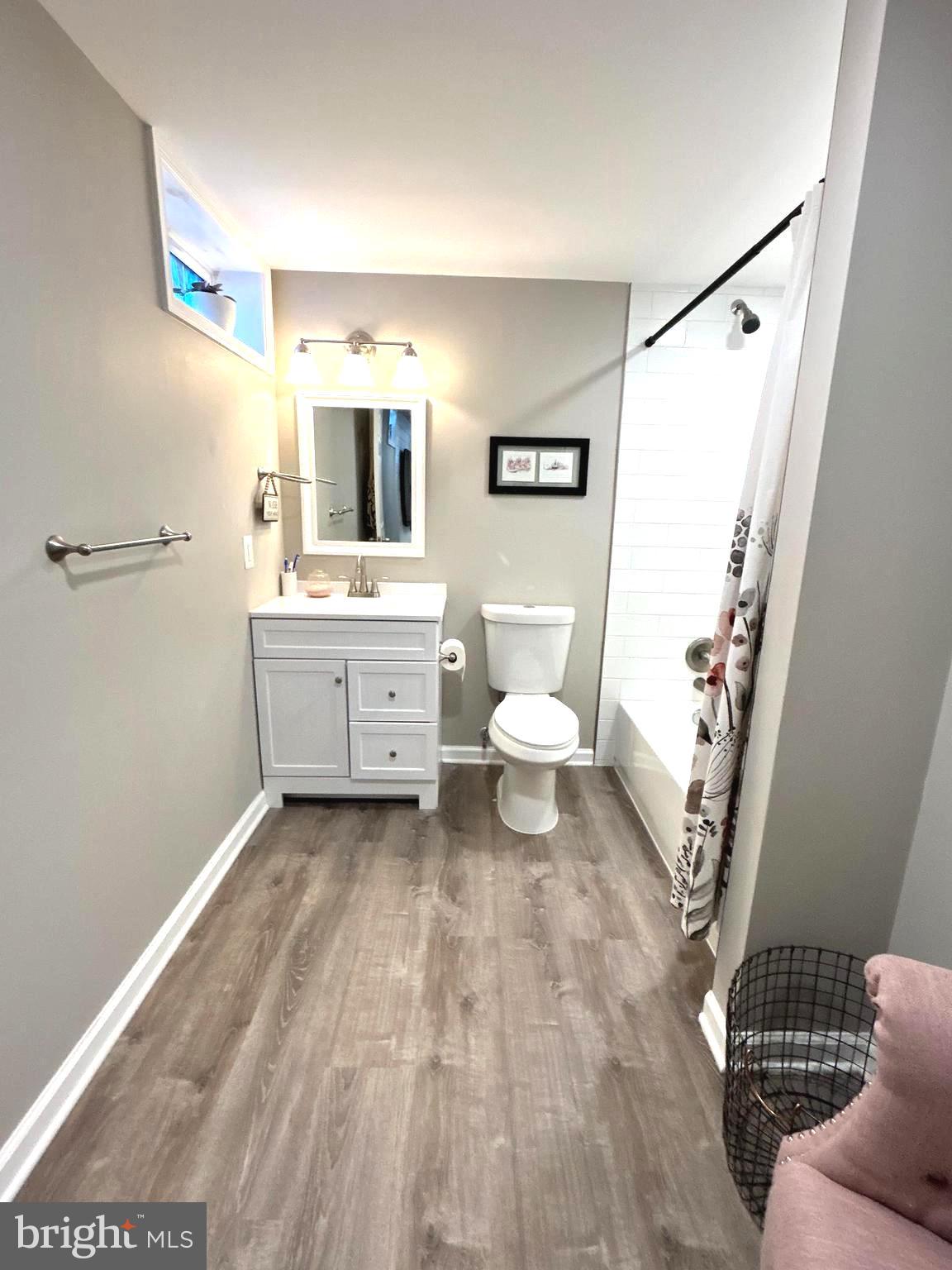 1522 Southview Road Bel Air, MD 21015 - Photo 6 of 7 a bathroom with a sink toilet and shower