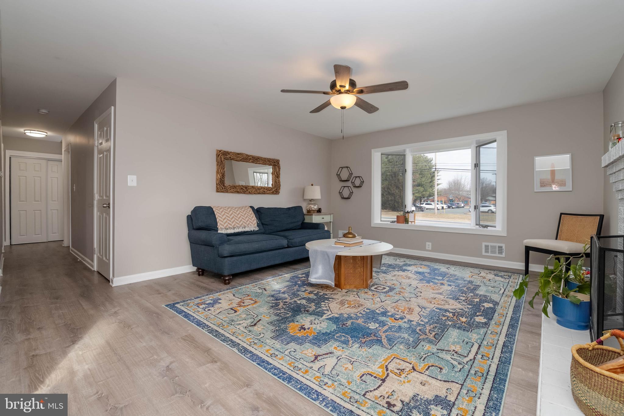 1522 Southview Road Bel Air, MD 21015 - Photo 8 of 42 a living room with furniture a window and a table