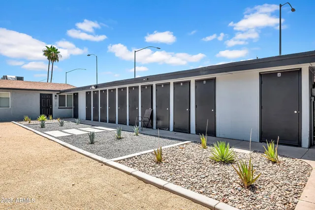 a house view with a backyard space