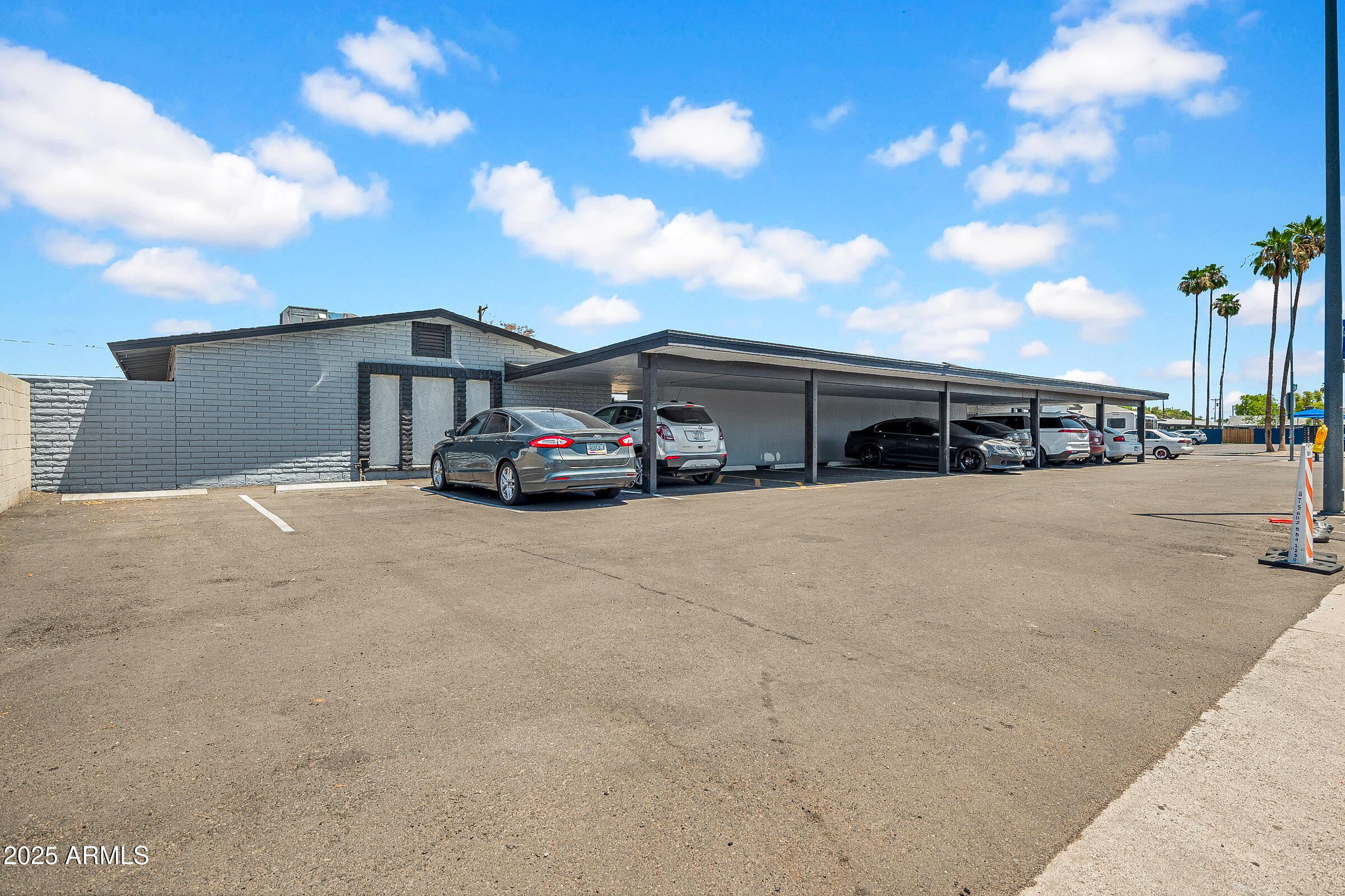 1432 East Broadway Road Mesa, AZ 85204 - Photo 9 of 13 a view of car parked in front of house