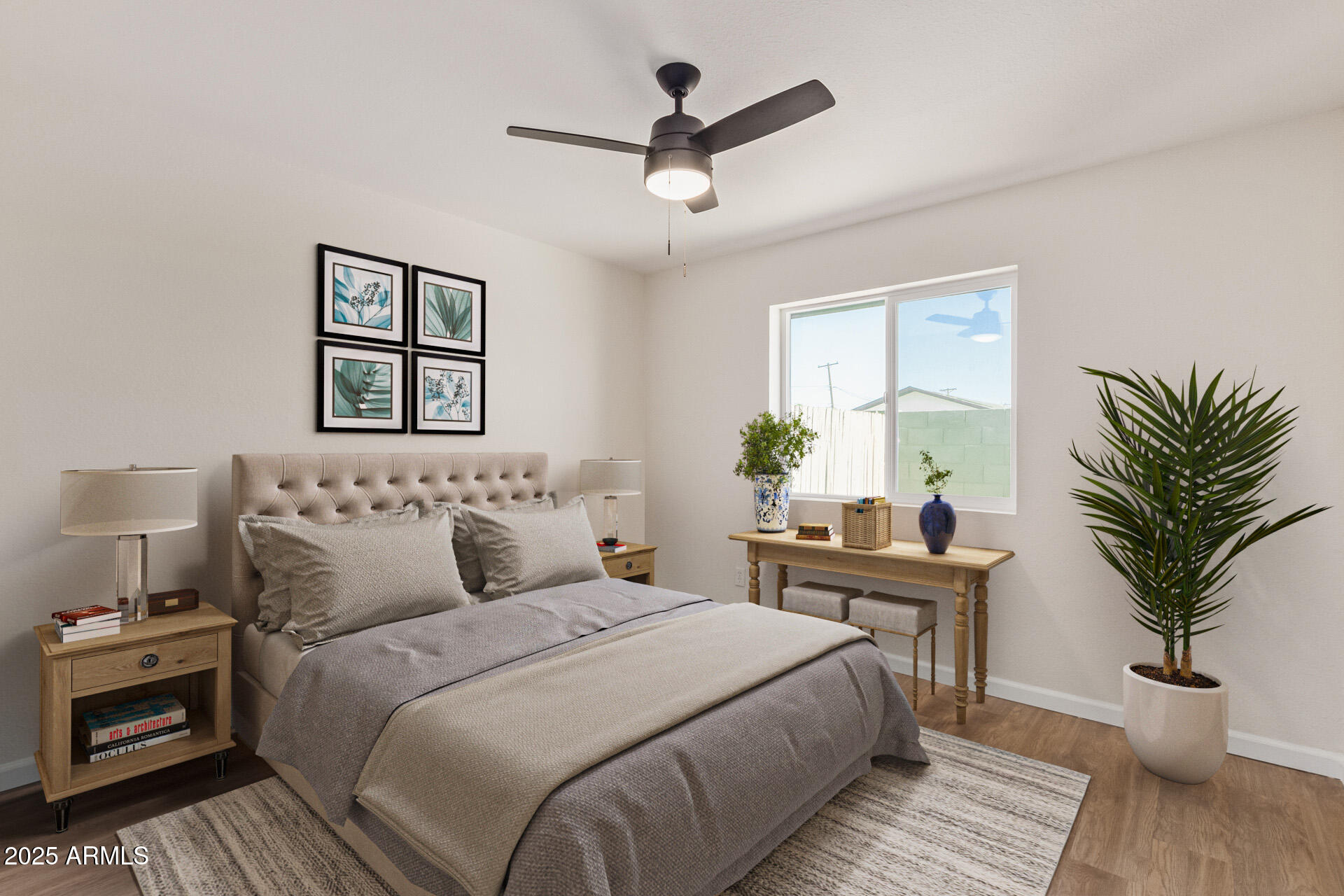 1432 East Broadway Road Mesa, AZ 85204 - Photo 10 of 13 a bedroom with a large bed and a chandelier