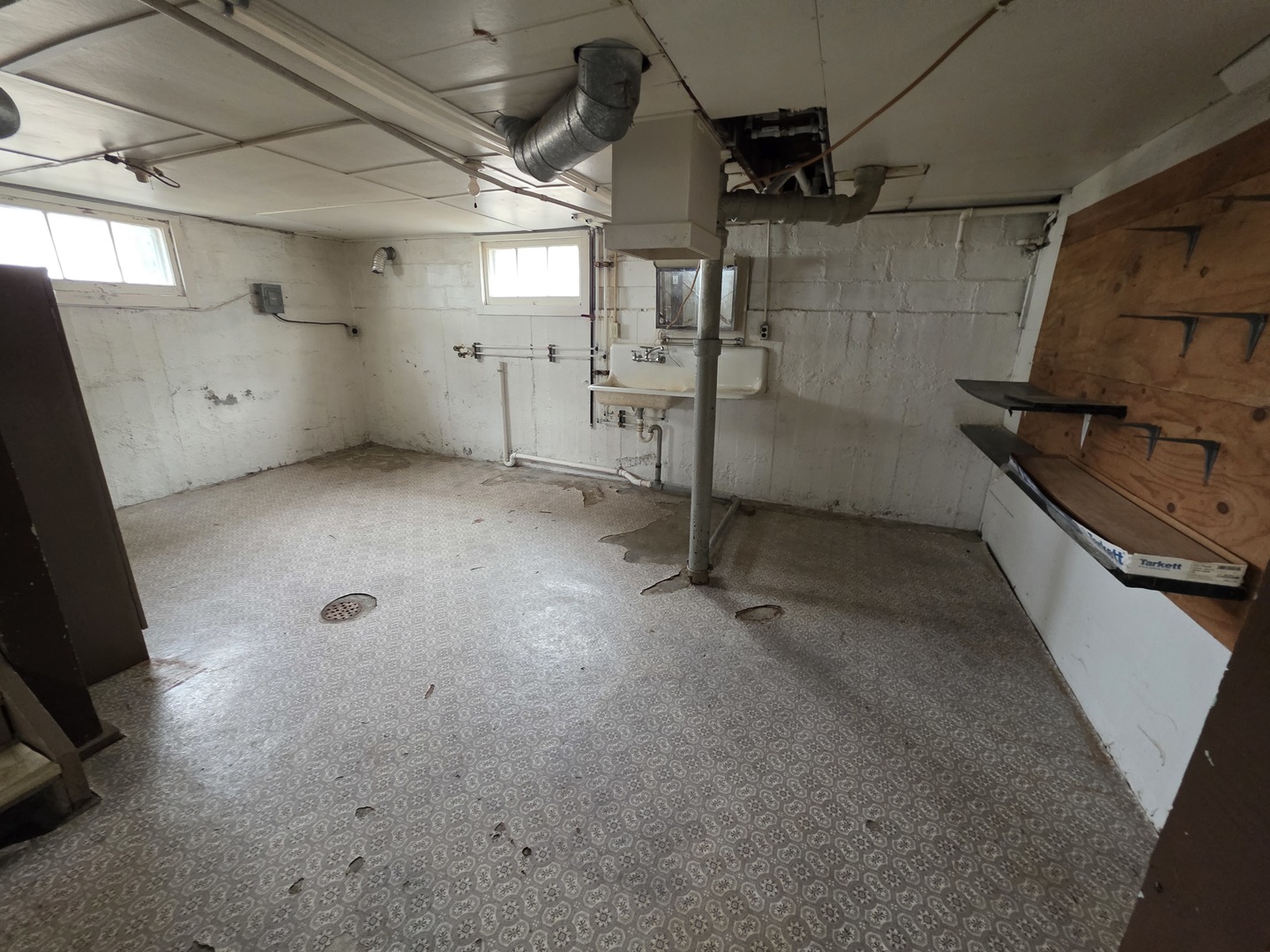 312 East 11th Street Sterling, IL 61081 - Photo 16 of 21 a view of a room with racks on the wall