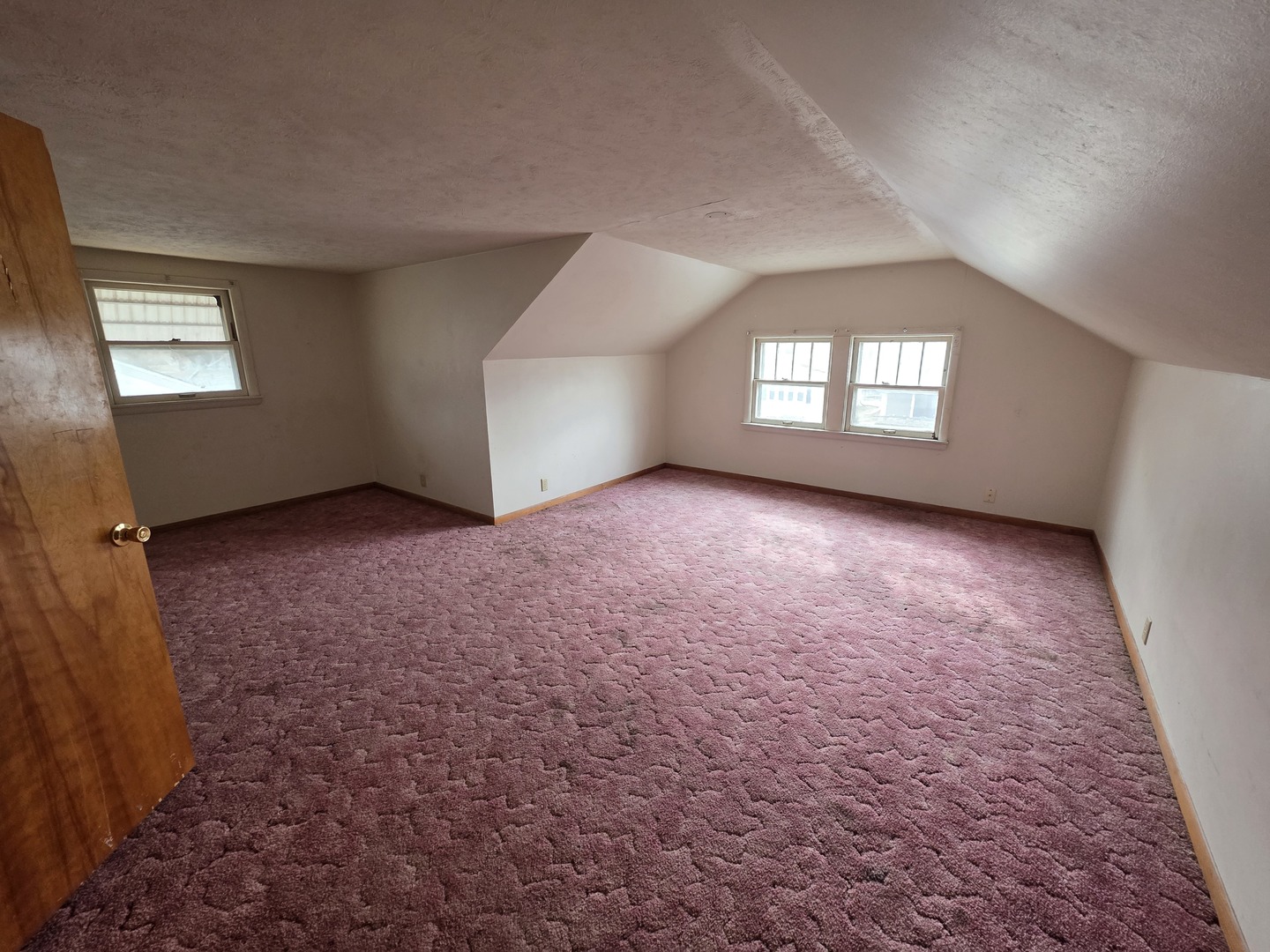 312 East 11th Street Sterling, IL 61081 - Photo 20 of 21 an empty room with windows