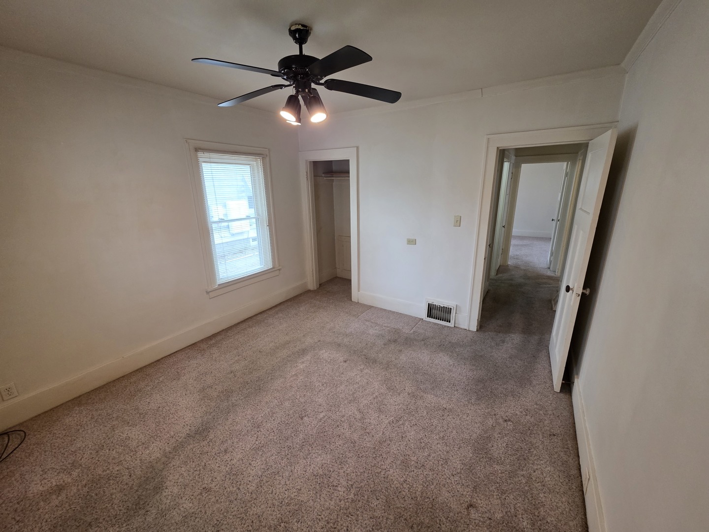 312 East 11th Street Sterling, IL 61081 - Photo 10 of 21 a view of an empty room with a window