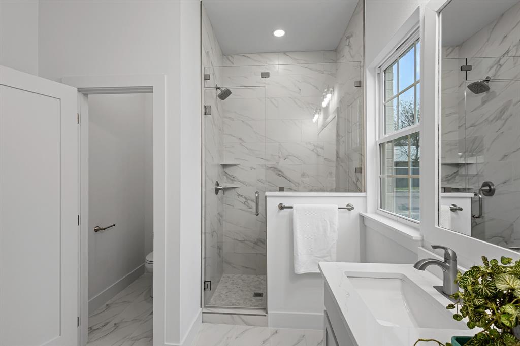 1812 Carpenter Street Bridgeport, TX 76426 - Photo 24 of 30 a bathroom with a sink and shower