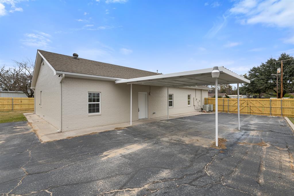 1812 Carpenter Street Bridgeport, TX 76426 - Photo 27 of 30 a view of a house with backyard